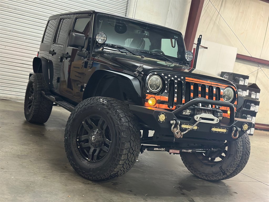 Used 2014 Jeep Wrangler Unlimited Sport with VIN 1C4HJWDG7EL115078 for sale in Dawsonville, GA